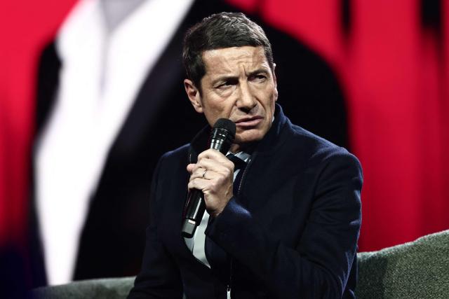 President of the "France's Mayors' association" (AMF) David Lisnard speaks on during "Face a vous - Les grands enjeux de demain" (Face to face with you - The major challenges of tomorrow) debate show hosted by French weekly newspaper Le Journal du Dimanche (JDD) at the Le Dome de Paris - Palais des Sports in Paris on November 25, 2025. (Photo by Thibaud MORITZ / AFP)