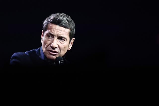 President of the "France's Mayors' association" (AMF) David Lisnard speaks on during "Face a vous - Les grands enjeux de demain" (Face to face with you - The major challenges of tomorrow) debate show hosted by French weekly newspaper Le Journal du Dimanche (JDD) at the Le Dome de Paris - Palais des Sports in Paris on November 25, 2025. (Photo by Thibaud MORITZ / AFP)