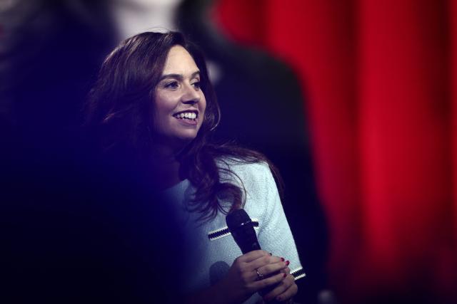 French far-right party Reconquete! MEP Sarah Knafo reacts during "Face a vous - Les grands enjeux de demain" (Face to face with you - The major challenges of tomorrow) debate show hosted by French weekly newspaper Le Journal du Dimanche (JDD) at the Le Dome de Paris - Palais des Sports in Paris on November 25, 2025. (Photo by Thibaud MORITZ / AFP)