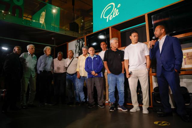 Neymar Santos SR (R), father of Brazilian forward Neymar Jr and owner of NR Sports, speaks to the media at the announcement of the acquisition of late Brazilian football legend Pele brand at the Pele Museum, in Santos, Sao Paulo, Brazil on November 25, 2025. (Photo by Miguel SCHINCARIOL / AFP)