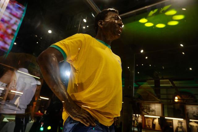 An effigy of late Brazilian football legend Pele is pictured at the Pele Museum after the announcement of the acquisition of Pele's brand by NR Sports in Santos, Sao Paulo, Brazil on November 25, 2025. (Photo by Miguel SCHINCARIOL / AFP)