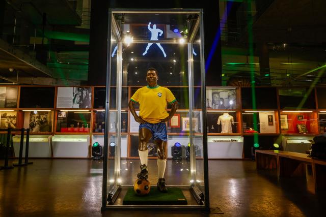 An effigy of late Brazilian football legend Pele is pictured at the Pele Museum after the announcement of the acquisition of Pele's brand by NR Sports in Santos, Sao Paulo, Brazil on November 25, 2025. (Photo by Miguel SCHINCARIOL / AFP)