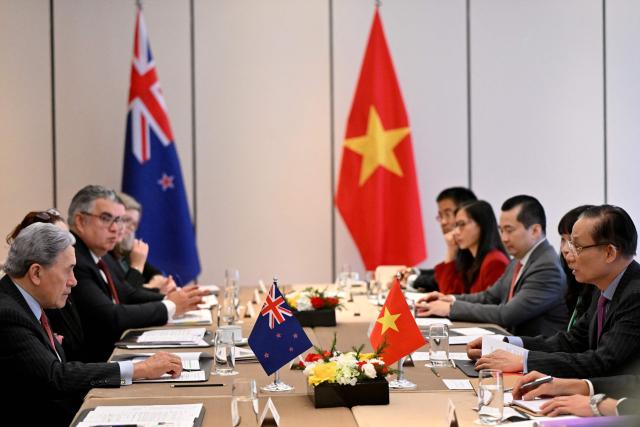 New Zealand's Foreign Minister Winston Peters (L) meets with Vietnam's Foreign Minister Le Hoai Trung (R) in Hanoi on November 26, 2025. (Photo by Nhac NGUYEN / AFP)
