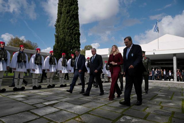 Greek President Constantine Tassoulas (3rdR), Executive Board and the IOC President Kirsty Coventry (2ndR) and Hellenic Olympic Committee President Isidoros Kouvelos (R) walk during the flame lighting ceremony of the Olympic flame, for the Olympic Winter Games Milano Cortina 2026, at the Museum of ancient Olympia, in Olympia on November 26, 2025. (Photo by Aggelos NAKKAS / AFP)