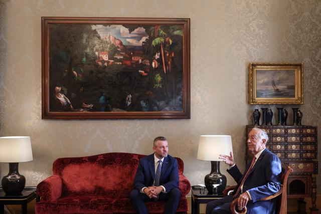 Portuguese President Marcelo Rebelo de Sousa (R) meets with Slovak President Peter Pellegrini at Belem Palace in Lisbon on November 26, 2025. Slovak President Peter Pellegrini will be in Portugal for a 2 days State visit. (Photo by PATRICIA DE MELO MOREIRA / AFP)