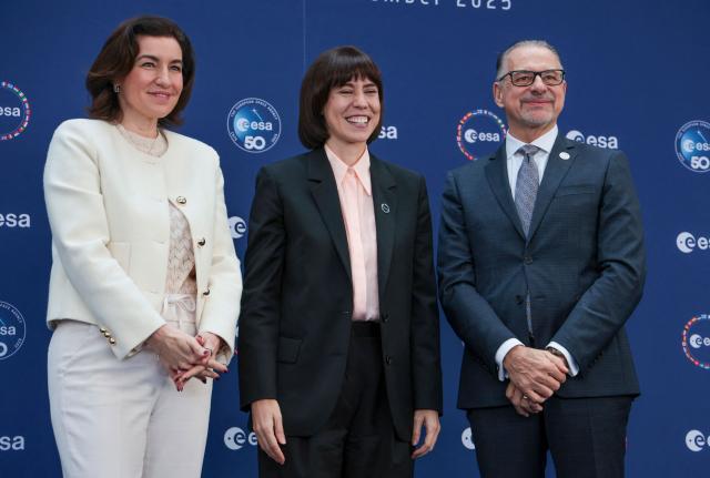 (From L) German Minister for Research, Technology and Aerospace Dorothee Baer, Spanish Minister of Science, Innovation and Universities Diana Morant Ripoll and ERSA General Director Josef Aschbacher pose for the medias during the European Space Agency (ESA) ministerial meeting at the Congress Centrum in Bremen, northern Germany, on November 26, 2025. Ministers from the 23 member states of the European Space Agency (ESA) meet in the Hanseatic city for two days to discuss the strategic direction of European spaceflight. (Photo by FOCKE STRANGMANN / AFP)