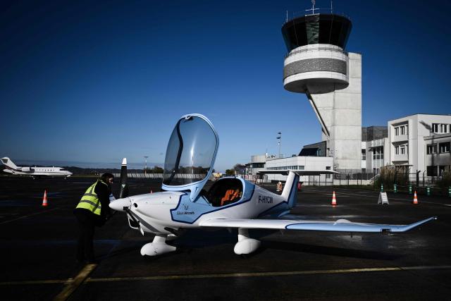 An Elixir aircraft built by La Rochelle-based Elixir Aircraft is displayed as part of the General Aviation Days event at Pau-Pyrénées airport, south-western France, on November 26, 2025. This aircraft features a carbon composite OneShot airframe that reduces fuel consumption to 15 liters per hour and cuts CO2 emissions by nearly 70 percent compared to conventional single-engine piston aircraft. The fifth edition of the professional gathering brings together pioneers of decarbonized light aviation to discuss new energy solutions including electricity, hydrogen and sustainable aviation fuels. (Photo by Philippe LOPEZ / AFP)