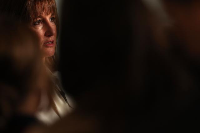 Britain's Chancellor of the Exchequer Rachel Reeves takes a question from a journalist after speaking to nurses and members of the media during a visit to University College London Hospital in London, on November 26, 2025. (Photo by Adrian Dennis / POOL / AFP)