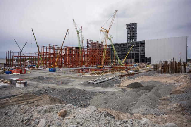 (FILES) The construction site of Stegras green-steel plant is pictured on June 10, 2025, in Boden, Northern Sweden. The Swedish Energy Agency said on November 26, 2025 it was giving some USD 40 million in support to low-carbon steelmaker Stegra, amid fears surrounding the ambitious startup's finances. Stegra is building a new steel mill it says will produce steel using technology that gives off 95 percent less CO2 emissions than traditional methods. Approximately 60 percent of the work has been completed. In October, Stegra announced another round of financing to bring in an additional 10 billion kronor (USD 1 billion) to cover higher project costs. (Photo by Jonathan NACKSTRAND / AFP)