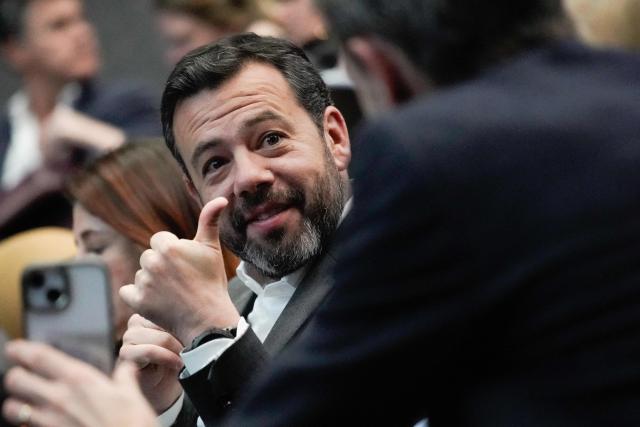 Bogota Mayor Carlos Fernando Galan attends the commemoration of nine years of the peace agreement at Cinemateca in Bogota on November 26, 2025. (Photo by Sergio Yate / AFP)
