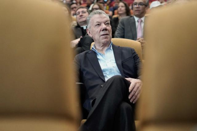Former Colombian president and 2016 Nobel Peace Prize laureate Juan Manuel Santos attends the commemoration of nine years of the peace agreement at Cinemateca in Bogota on November 26, 2025. (Photo by Sergio Yate / AFP)