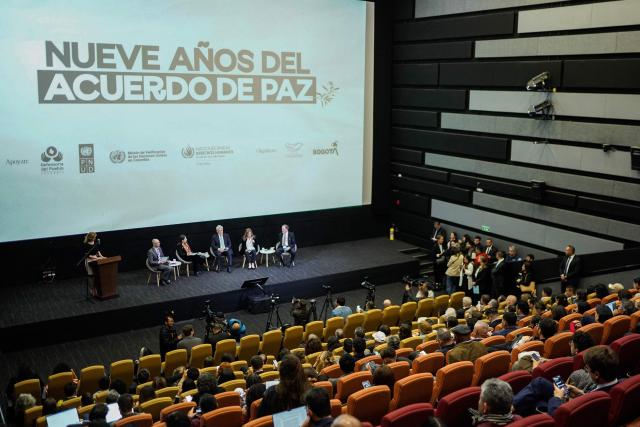 General view during the commemoration of nine years of the peace agreement at Cinemateca in Bogota on November 26, 2025. (Photo by Sergio Yate / AFP)