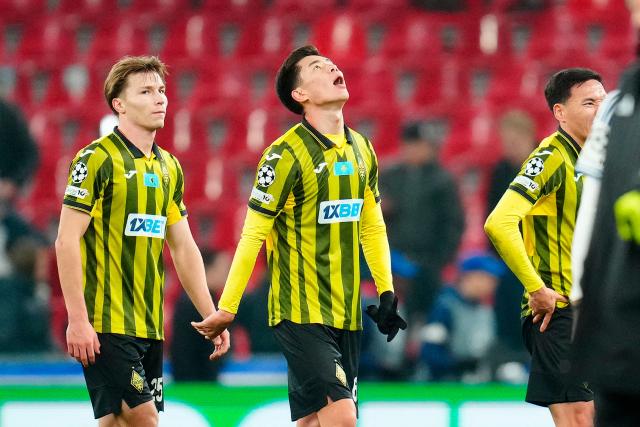 Kairat Almaty's Kazakh defender #25 Alexander Shirobokov (L) and Kairat Almaty's Kazakh midfielder #06 Adilet Sadybekov (C) react after the end of the UEFA Champions League league phase day 5 football match between FC Copenhagen and FC Kairat Almaty in Copenhagen, Denmark, on November 26, 2025. (Photo by Ida Marie Odgaard / Ritzau Scanpix / AFP) / Denmark OUT