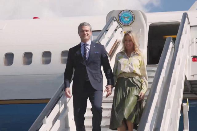 This screengrab of video footage taken and released by the US Department of Defense on November 26, 2025, shows the Secretary of Defense Pete Hegseth (L) and his wife Jennifer Rauchet arriving in Santo Domingo, Dominican Republic. Hegseth will meet with Dominican Republic President Luis Abinader and other officials "to strengthen defense relationships and reaffirm America's commitment to defend the homeland, protect our regional partners and ensure stability and security across the Americas", according to an official press release. (Photo by HANDOUT / US Department of Defense / AFP)
