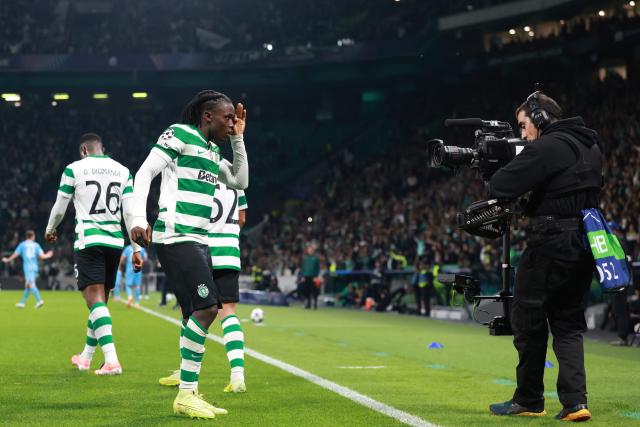 Sporting Lisbon's Portuguese midfielder #07 Geovany Quenda celebrates scoring the opening goal during the UEFA Champions League, league phase day 5 football match between Sporting CP and Club Brugge at Jose Alvalade stadium in Lisbon on November 26, 2025. (Photo by PATRICIA DE MELO MOREIRA / AFP)