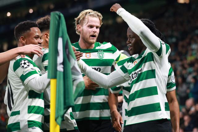 Sporting Lisbon's Portuguese midfielder #07 Geovany Quenda (R)celebrates scoring the opening goal during the UEFA Champions League, league phase day 5 football match between Sporting CP and Club Brugge at Jose Alvalade stadium in Lisbon on November 26, 2025. (Photo by PATRICIA DE MELO MOREIRA / AFP)