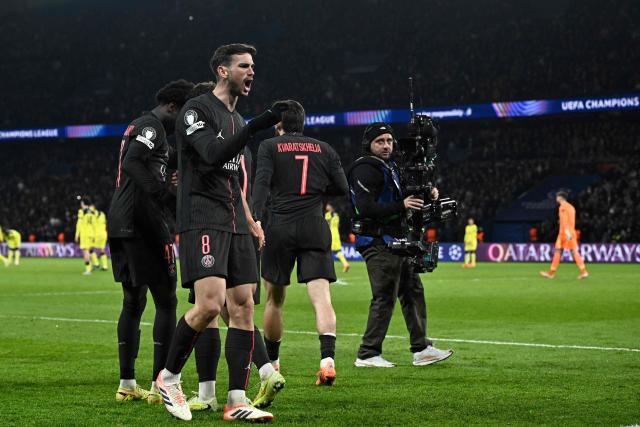 Paris Saint-Germain's Spanish midfielder #08 Fabian Ruiz (C) celebrates after scoring his team's third goal  during the UEFA Champions League, league phase - matchday 5, football match between Paris Saint-Germain (PSG) and Tottenham Hotspur FC at the Parc des Princes stadium in Paris on November 26, 2025. (Photo by JULIEN DE ROSA / AFP)