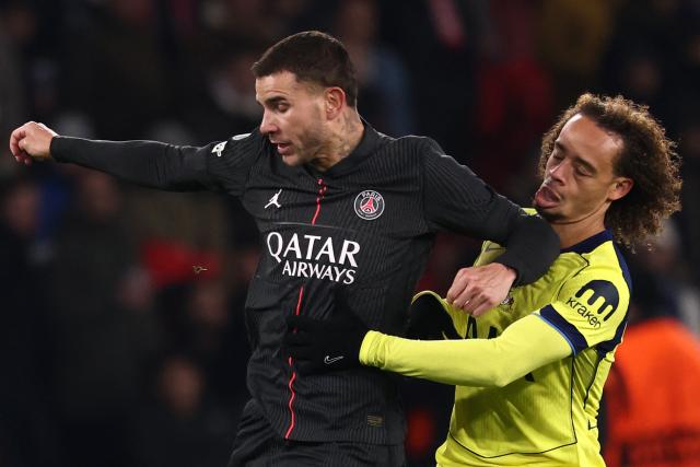 Paris Saint-Germain's French defender #21 Lucas Hernandez (L) fouls Tottenham's Dutch midfielder #07 Xavi Simons (R) for which he received a red card during the UEFA Champions League, league phase - matchday 5, football match between Paris Saint-Germain (PSG) and Tottenham Hotspur FC at the Parc des Princes stadium in Paris on November 26, 2025. (Photo by FRANCK FIFE / AFP)