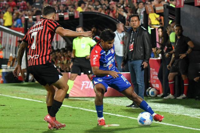Alajuelense's forward #07 Anthony Hernandez and Xelaju's midfielder #10 Antonio Lopez fight for the ball during the CONCACAF Central American Cup final first leg football match between Guatemala's Xelaju and Costa Rica's Alajuelense at the Alejandro Morera Soto Stadium in Alajuela, Costa Rica, on November 26, 2025. (Photo by Ezequiel BECERRA / AFP)