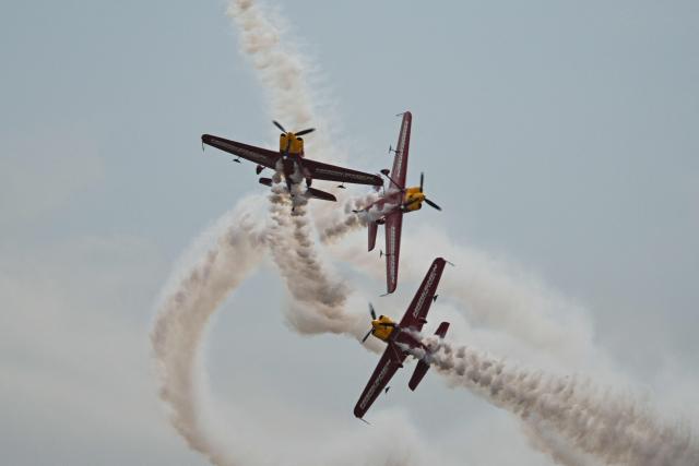 TOPSHOT - The Marksmen aerobatic team from South Africa performs during the Aero Asia 2025 in Zhuhai, in southern China's Guangdong province on November 27, 2025. Aero Asia 2025 is an international aviation and aerospace exhibition that runs between November 27 and 30. (Photo by Hector RETAMAL / AFP)