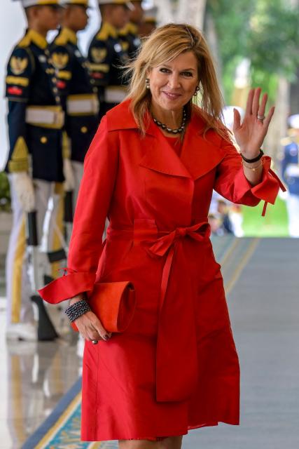 Queen Maxima of the Netherlands, in her capacity as the UN Secretary General's Special Advocate for Financial Health (UNSGSA), waves to journalists at the Merdeka Palace in Jakarta on November 27, 2025, during her meeting with Indonesian President Prabowo Subianto (not pictured). (Photo by BAY ISMOYO / AFP)