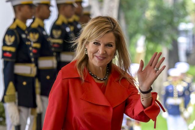 Queen Maxima of the Netherlands, in her capacity as the UN Secretary General's Special Advocate for Financial Health (UNSGSA), waves at journalists at the Merdeka Palace in Jakarta on November 27, 2025, during her meeting with Indonesian President Prabowo Subianto (not pictured). (Photo by BAY ISMOYO / AFP)