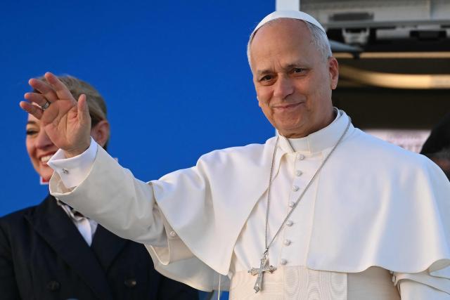 Pope Leo XIV boards a plane heading to Ankara for his first apostolic journey to Turkey and Lebanon, at Rome's Fiumicino airport on November 27, 2025. (Photo by Filippo MONTEFORTE / AFP)