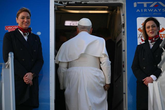 Pope Leo XIV boards a plane heading to Ankara for his first apostolic journey to Turkey and Lebanon, at Rome's Fiumicino airport on November 27, 2025. (Photo by Filippo MONTEFORTE / AFP)