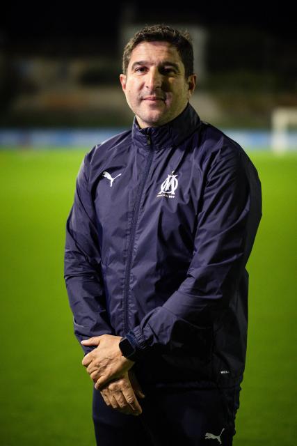 Olympic de Marseille (OM) "Football for amputee" head coach Karim Belounis poses during a training session at the "OM Campus" in Marseille, southeastern France, on November 22, 2025. Accidents or illness may have taken a leg or a hand from them, but not their desire or joy to play football at a high level: on the weekend of November 29, 2025, OM's amputee team begins the French championship at home, dreaming of the Champions League. (Photo by CLEMENT MAHOUDEAU / AFP)