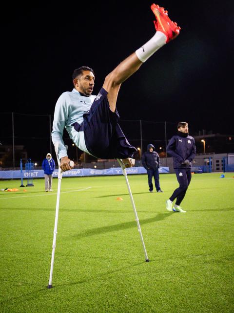 Ali Katasse of the Olympic de Marseille (OM) "Football for amputee" team takes part in a training session at the "OM Campus" in Marseille, southeastern France, on November 22, 2025. Accidents or illness may have taken a leg or a hand from them, but not their desire or joy to play football at a high level: on the weekend of November 29, 2025, OM's amputee team begins the French championship at home, dreaming of the Champions League. (Photo by CLEMENT MAHOUDEAU / AFP)