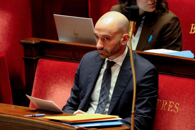 France's junior Minister in charge of Europe Benjamin Haddad looks on during the opposition parliamentary time slot of French left-wing La France Insoumise (LFI) party at the French National Assembly, the French Parliament lower house, in Paris on November 27, 2025. (Photo by Ludovic MARIN / AFP)