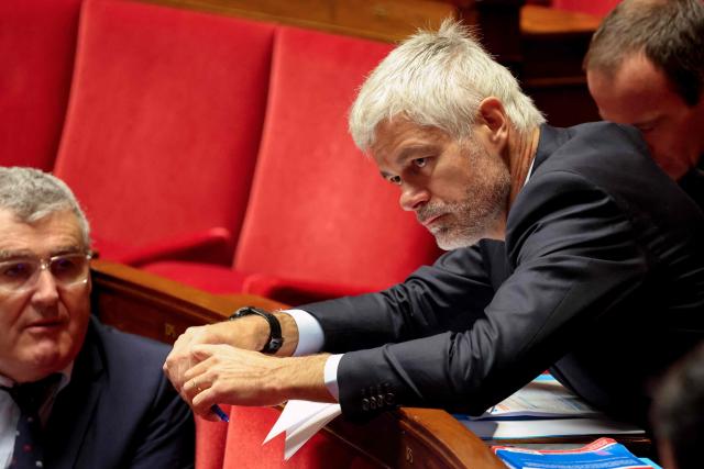 Droite Republicaine's MP and National Assembly vice-president Xavier Breton (L), President of Droite Republicaine parliamentary group Laurent Wauquiez look on during the opposition parliamentary time slot of French left-wing La France Insoumise (LFI) party at the French National Assembly, the French Parliament lower house, in Paris on November 27, 2025. (Photo by Ludovic MARIN / AFP)