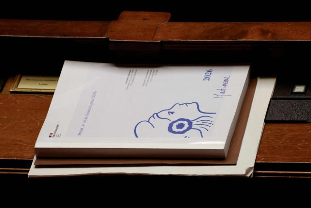 This photograph shows an MP's booklet on France's draft budget law for 2026 during the opposition parliamentary time slot of French left-wing La France Insoumise (LFI) party at the French National Assembly, the French Parliament lower house, in Paris on November 27, 2025. (Photo by Ludovic MARIN / AFP)