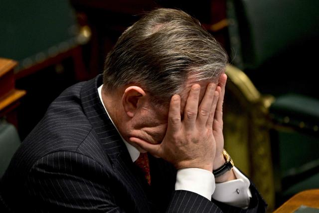 Belgium's Prime Minister Bart De Wever gestures during a plenary session at Belgium's federal parliament, in Brussels on November 27, 2025. (Photo by DIRK WAEM / Belga / AFP) / Belgium OUT