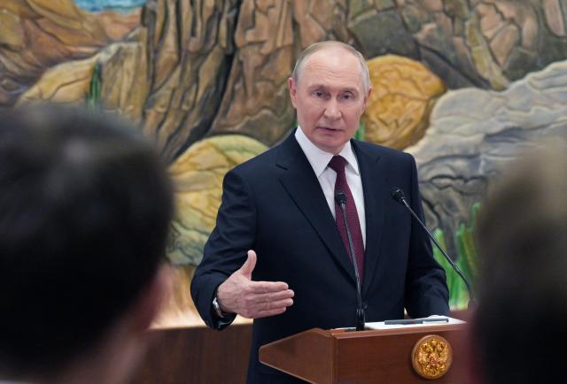 In this pool photograph distributed by the Russian state agency Sputnik, Russia's President Vladimir Putin meets with the Russian media in Bishkek on November 27, 2025. (Photo by Alexey NIKOLSKY / POOL / AFP)