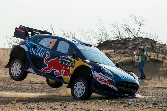 Qatar's Nasser al-Attiya and his co-driver, Spain's Candido Carrera in their Ford Puma car during stage 5 of the FIA World Rally Championship (WRC, in Jeddah on November 27, 2025. (Photo by Fayez Nureldine / AFP)