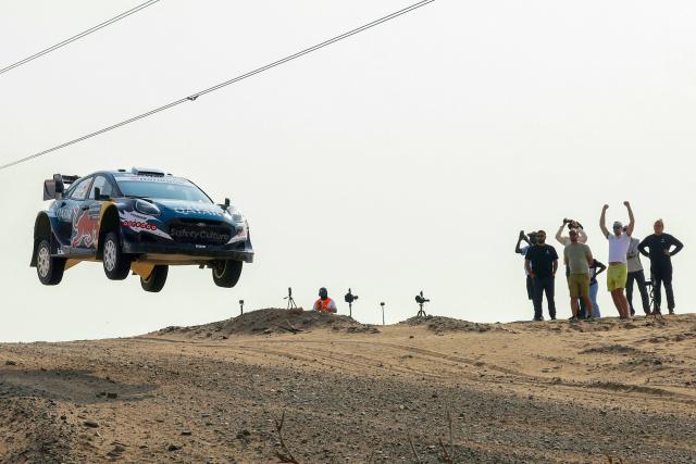 TOPSHOT - Qatar's Nasser al-Attiya and his co-driver, Spain's Candido Carrera in their Ford Puma car during stage 5 of the FIA World Rally Championship (WRC, in Jeddah on November 27, 2025. (Photo by Fayez Nureldine / AFP)