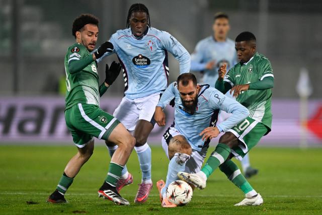 Celta Vigo's Spanish forward #07 Borja Iglesias (C) fights for the ball with Ludogorets Razgrad's Guinean midfielder #20 Aguibou Camara (R) and Ludogorets Razgrad's Brazilian midfielder #30 Pedro Naressi (L)  during the UEFA Europa League football match between Ludogorets Razgrad and RC Celta de Vigo in Razgrad on November 27, 2025. (Photo by Nikolay DOYCHINOV / AFP)