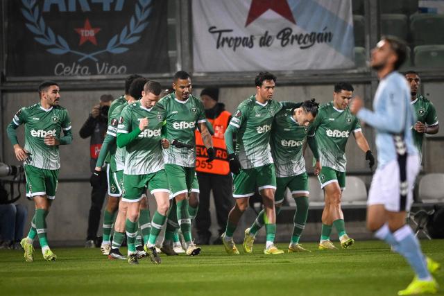 Ludogorets Razgrad's Serbian midfielder #14 Petar Stanic (C) celebrates with teammates after scoring a goal during the UEFA Europa League football match between Ludogorets Razgrad and RC Celta de Vigo in Razgrad on November 27, 2025. (Photo by Nikolay DOYCHINOV / AFP)