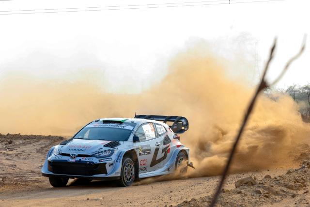 Toyota Gazoo Racing WRT Team's British Elfyn Evans and Co-driver Scott Martin compete in their Toyota GR Yaris Rally 1 during the second stage of the FIA World Rally Championship (WRC) in Jeddah on November 27, 2025. (Photo by Fayez Nureldine / AFP)