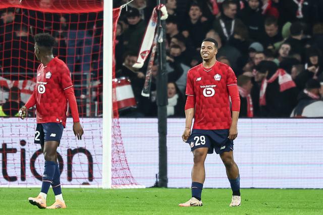 Lille's Moroccan forward #29 Hamza Igamane (R) celebrates after scoring his team's third goal during the UEFA Europa League football match between Lille (LOSC) and GNK Dinamo Zagreb at the Pierre-Mauroy Stadium in Villeneuve-d'Ascq, northern France, on November 27, 2025. (Photo by Sameer Al-DOUMY / AFP)