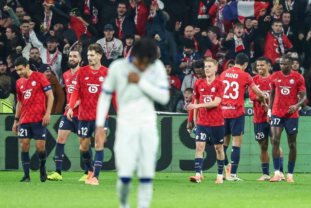 Lille's Moroccan forward #29 Hamza Igamane (2ndR) celebrates with his teammates after scoring his team's third goal during the UEFA Europa League football match between Lille (LOSC) and GNK Dinamo Zagreb at the Pierre-Mauroy Stadium in Villeneuve-d'Ascq, northern France, on November 27, 2025. (Photo by Sameer Al-DOUMY / AFP)