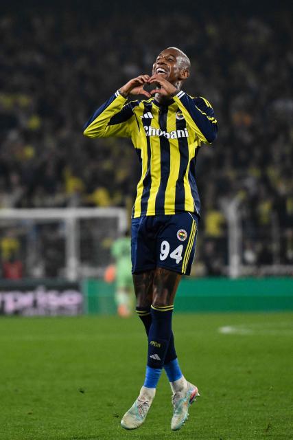 Fenerbahce's Brazilian Midfielder #94 Talisca celebrates after scoring a goal during the UEFA Europa League 5 round day football match between Ferencvarosi TC and Fenerbahce at the Chobani Stadium in Istanbul, on November 27, 2025. (Photo by Yasin AKGUL / AFP)