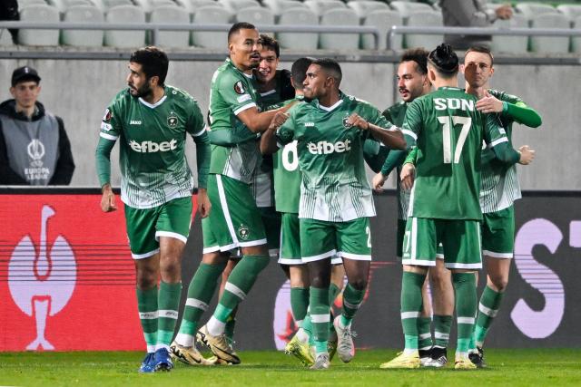 Ludogorets Razgrad's players celebrate their team's second goal during the UEFA Europa League football match between PFC Ludogorets Razgrad and RC Celta de Vigo at the Ludogorets Arena in Razgrad on November 27, 2025. (Photo by Nikolay DOYCHINOV / AFP)
