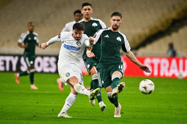 Sturm Graz's Georgian midfielder #10 Otar Kiteishvili (L) shoots to score his team's first goal during the   UEFA Europa League football match between Panathinaikos FC and SK Sturm Graz at the Apostolos Nikolaidis Stadium in Athens on November 27, 2025. (Photo by Aris MESSINIS / AFP)