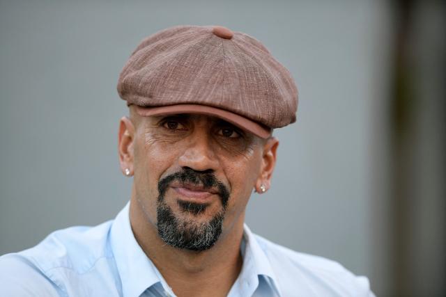 (FILES) Argentine former football player Juan Sebastian Veron is seen before the beginning of the Copa Libertadores third round second leg football match between Argentina's Estudiantes de La Plata and Chile's Everton at the Jorge Luis Hirschi stadium in La Plata, Argentina on March 16, 2022. The Disciplinary Tribunal of the Argentine Football Association (AFA) sanctioned Estudiantes de La Plata and its president, Juan Sebastian Veron, for turning their backs on unexpected champions Rosario Central during the team's pre-match entrance on November 23, 2025, according to the ruling. (Photo by Juan Mabromata / AFP)