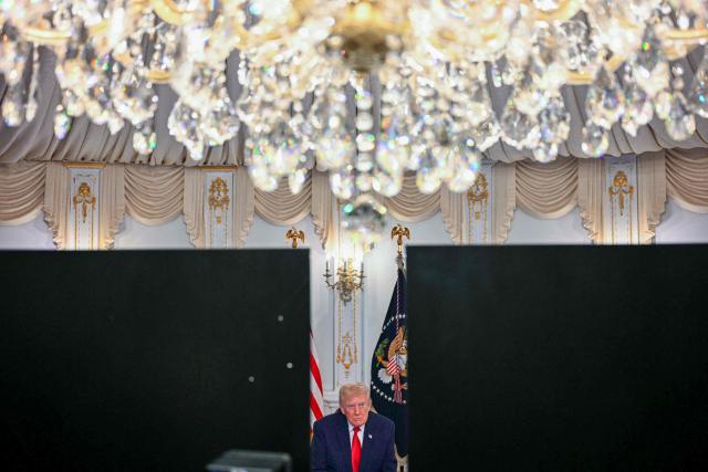 US President Donald Trump participates in a video call with military service members from his Mar-a-Lago residence in Palm Beach, Florida, on November 27, 2025, during the Thanksgiving holiday. US President Donald Trump said Thursday that Sarah Beckstrom, one of the two National Guard troops shot a day earlier near the White House, had died, while the other soldier was "fighting for his life." (Photo by Jim WATSON / AFP)