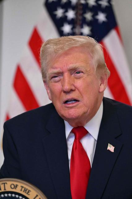 US President Donald Trump participates in a video call with military service members from his Mar-a-Lago residence in Palm Beach, Florida, on November 27, 2025, during the Thanksgiving holiday. US President Donald Trump said Thursday that Sarah Beckstrom, one of the two National Guard troops shot a day earlier near the White House, had died, while the other soldier was "fighting for his life." (Photo by Jim WATSON / AFP)