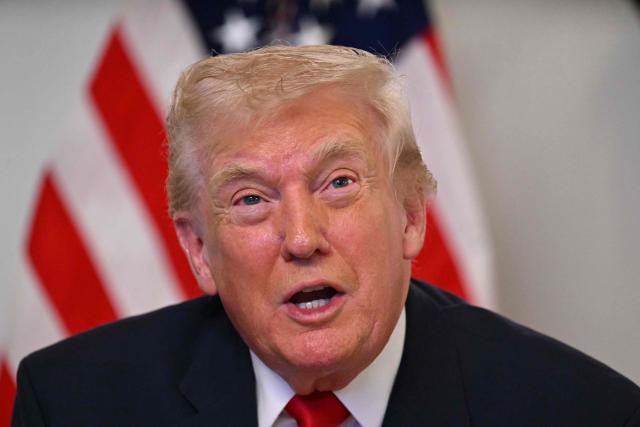 US President Donald Trump participates in a video call with military service members from his Mar-a-Lago residence in Palm Beach, Florida, on November 27, 2025, during the Thanksgiving holiday. US President Donald Trump said Thursday that Sarah Beckstrom, one of the two National Guard troops shot a day earlier near the White House, had died, while the other soldier was "fighting for his life." (Photo by Jim WATSON / AFP)