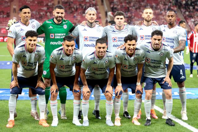Cruz Azul's players pose for a team photo ahead of the Liga MX Apertura quarter-final first leg football match between Guadalajara and Cruz Azul at the Akron Stadium in Zapopan, Mexico on November 27, 2025. (Photo by Ulises RUIZ / AFP)